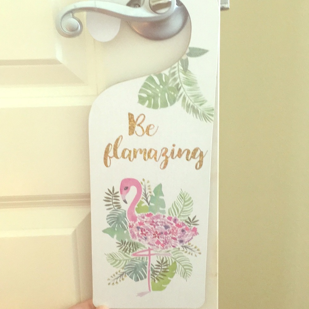 A thing that hangs on a door really cute decor